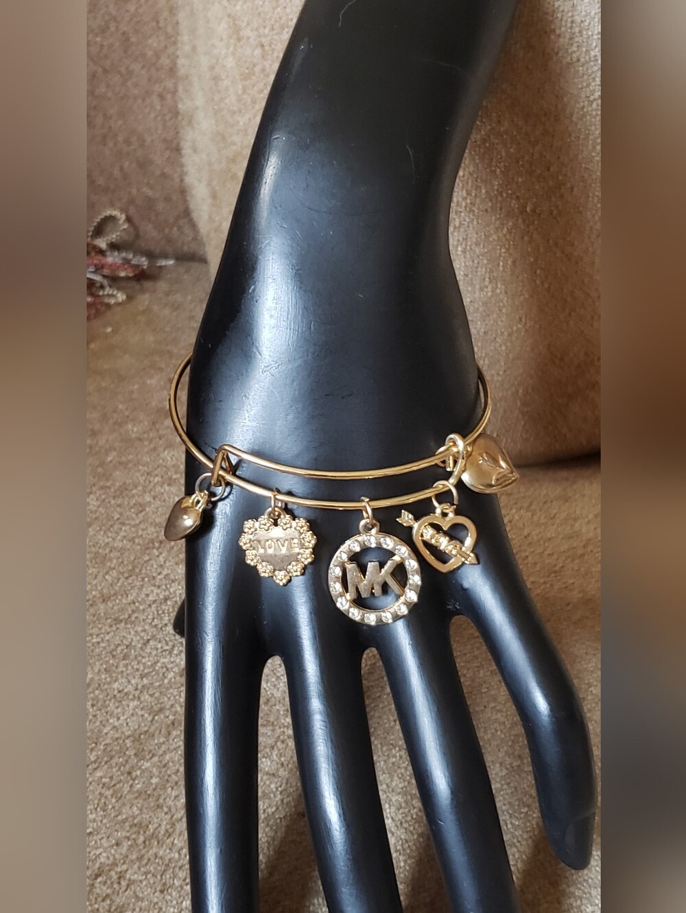 Gold-tone Charm Bangle Bracelet with Love Charms
